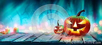 Jack Oâ€™ Lanterns In Spooky Forest With Ghost Lights Stock Photo